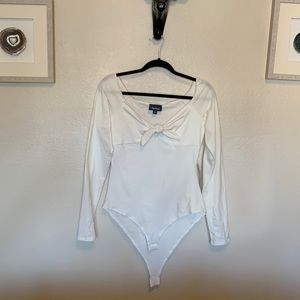 White long sleeve body suit with knot detail